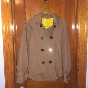 Brown trench-like coat.